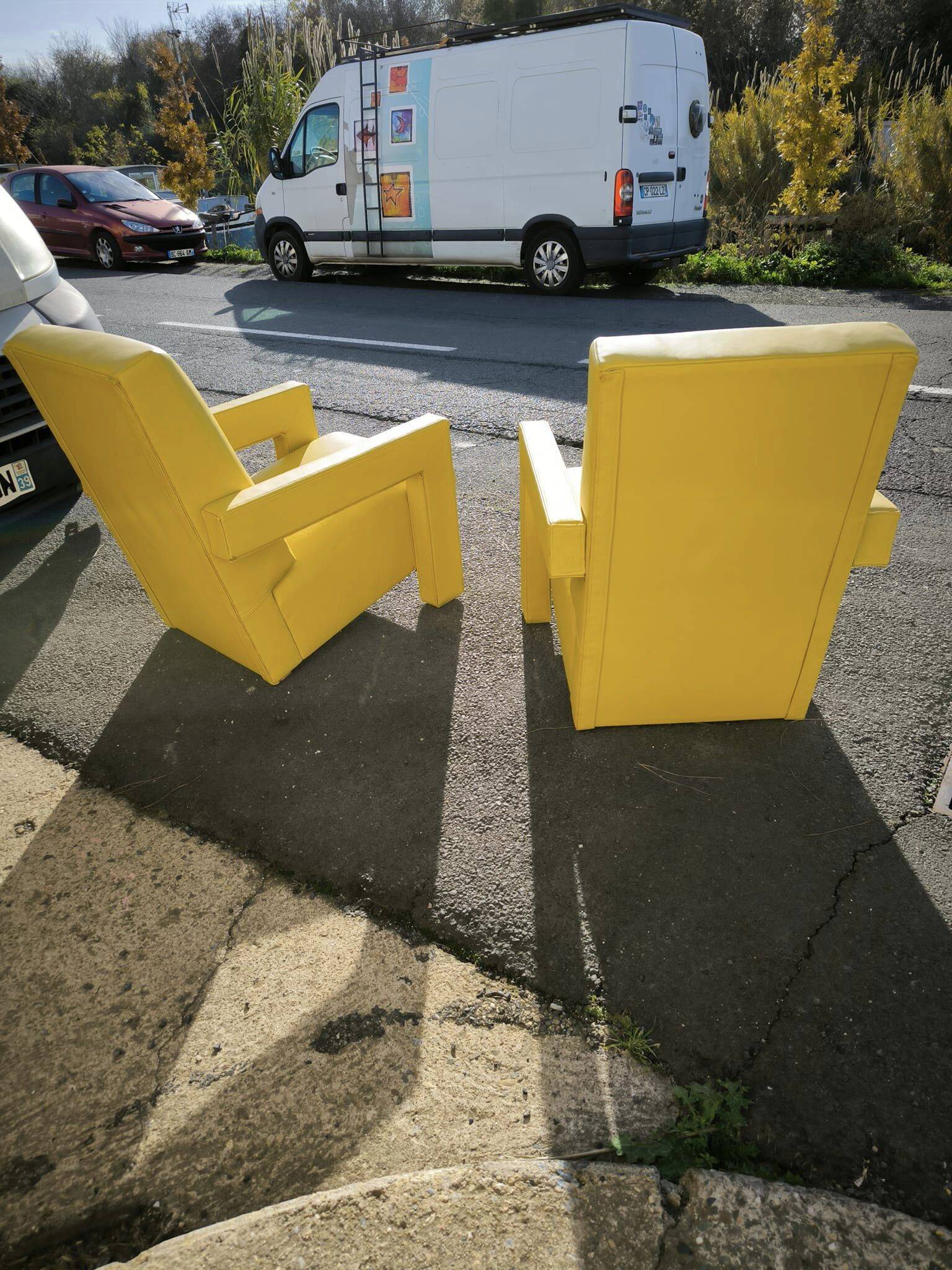 Pair of armchairs in sunny yellow leather