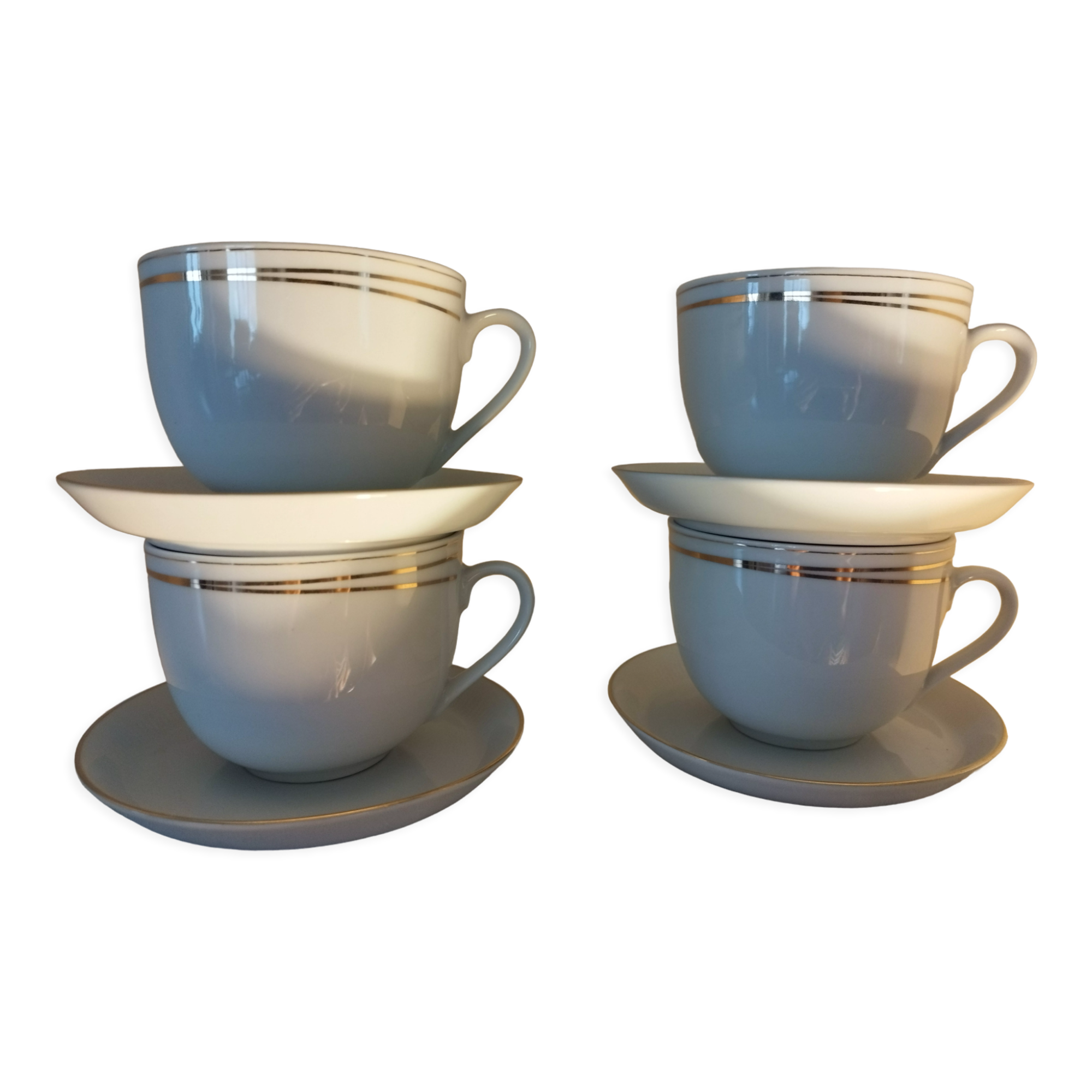 Set of 4 white and gold porcelain cups