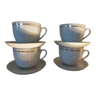 Set of 4 white and gold porcelain cups