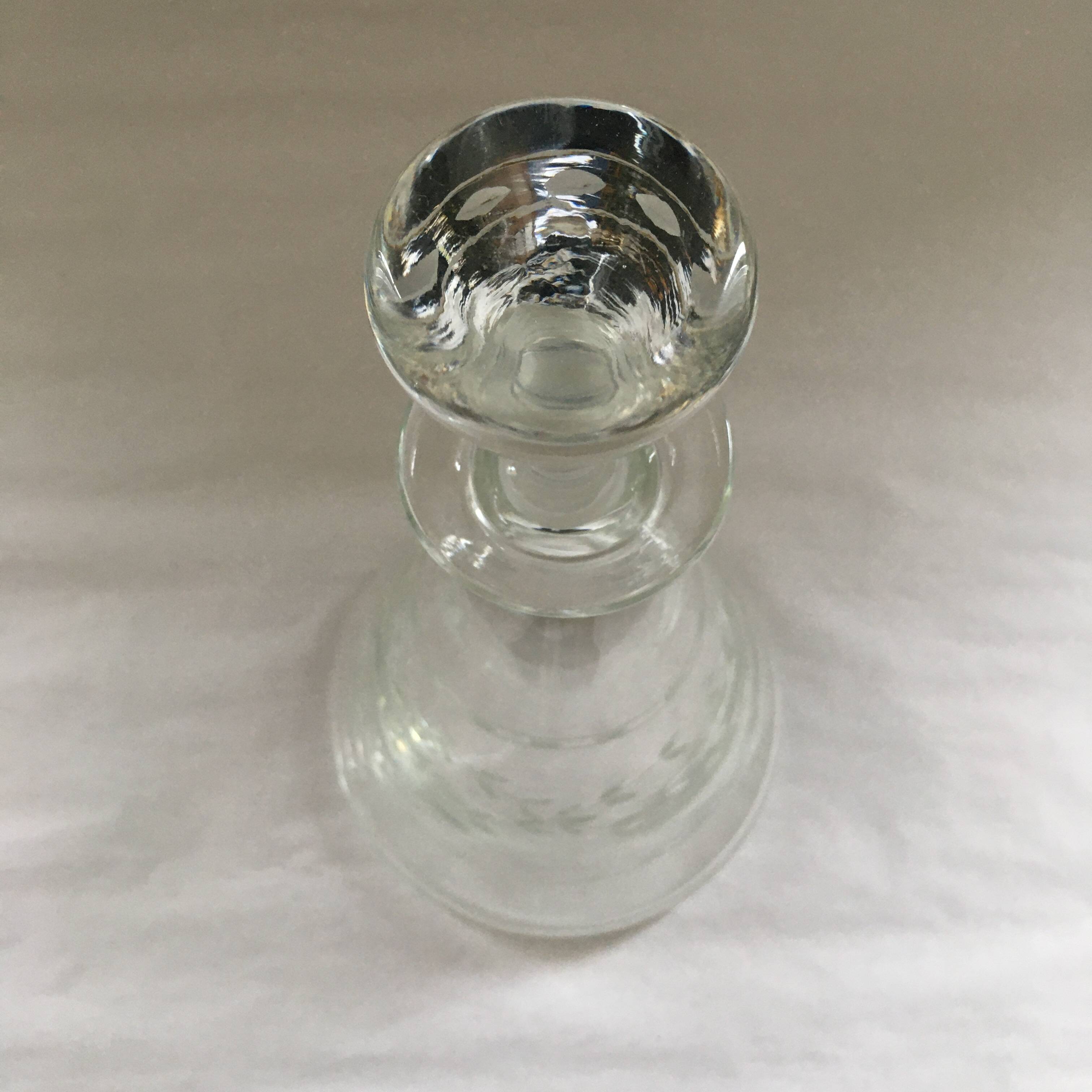 Carafe with chiseled floral decoration
