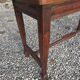 Beechwood piano bench with caning on the seat