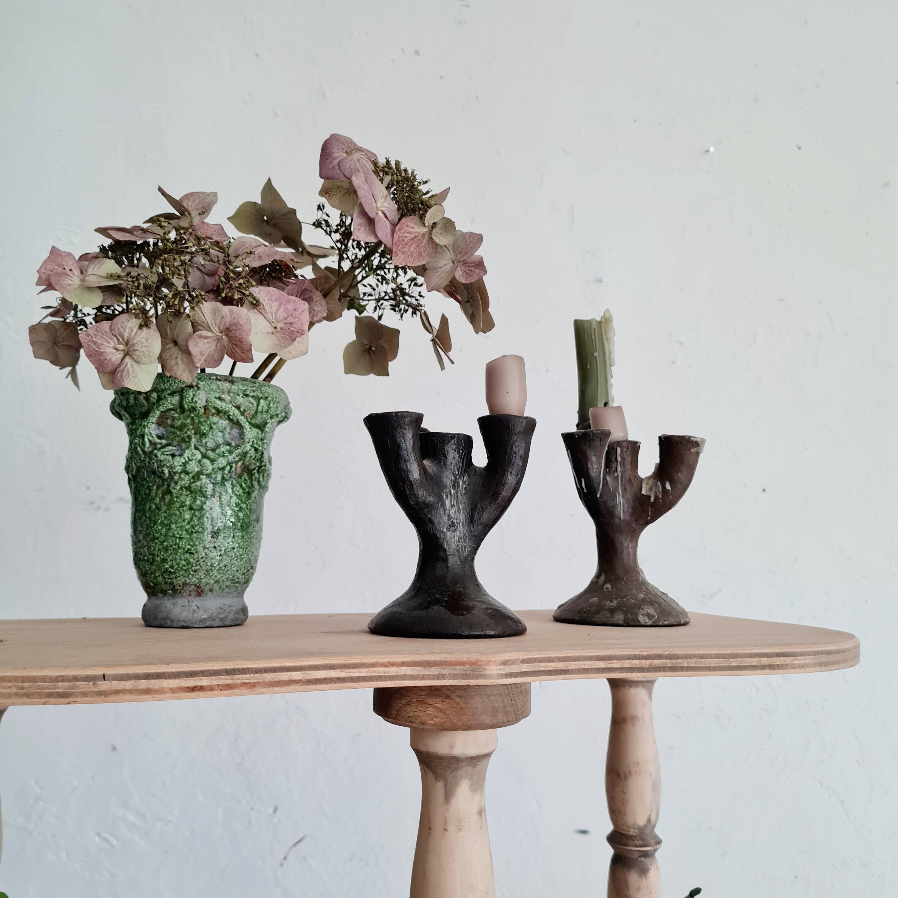 Antique terracotta candlesticks