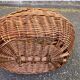 Round oval basket in rattan and woven wicker with handle
