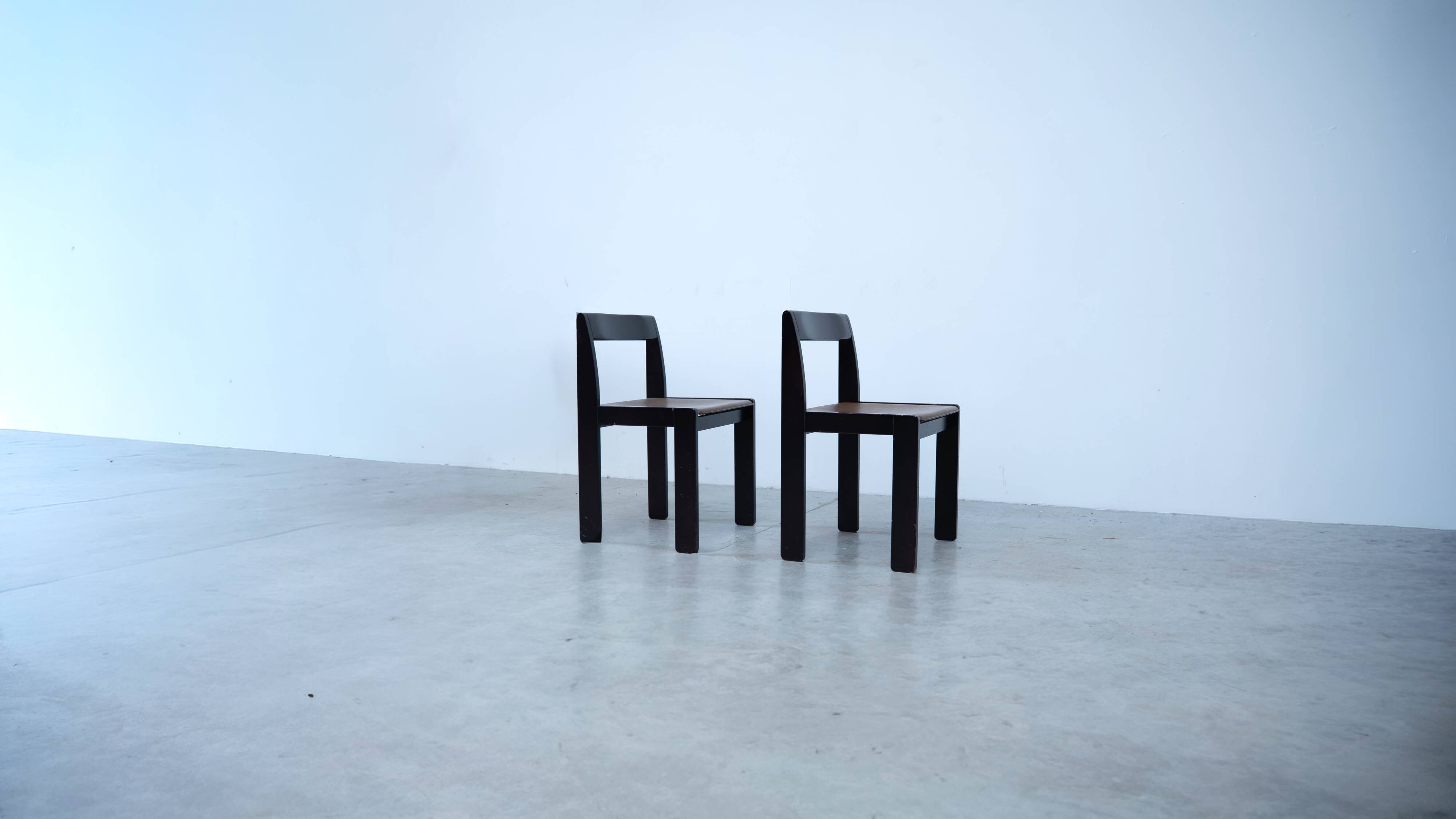Set of eight black lacquered dining chairs