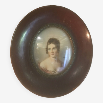 Miniature woman portrait in frame