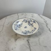 Hollow plate in ironstone from Terre de Feu of Grigny with floral decoration bl