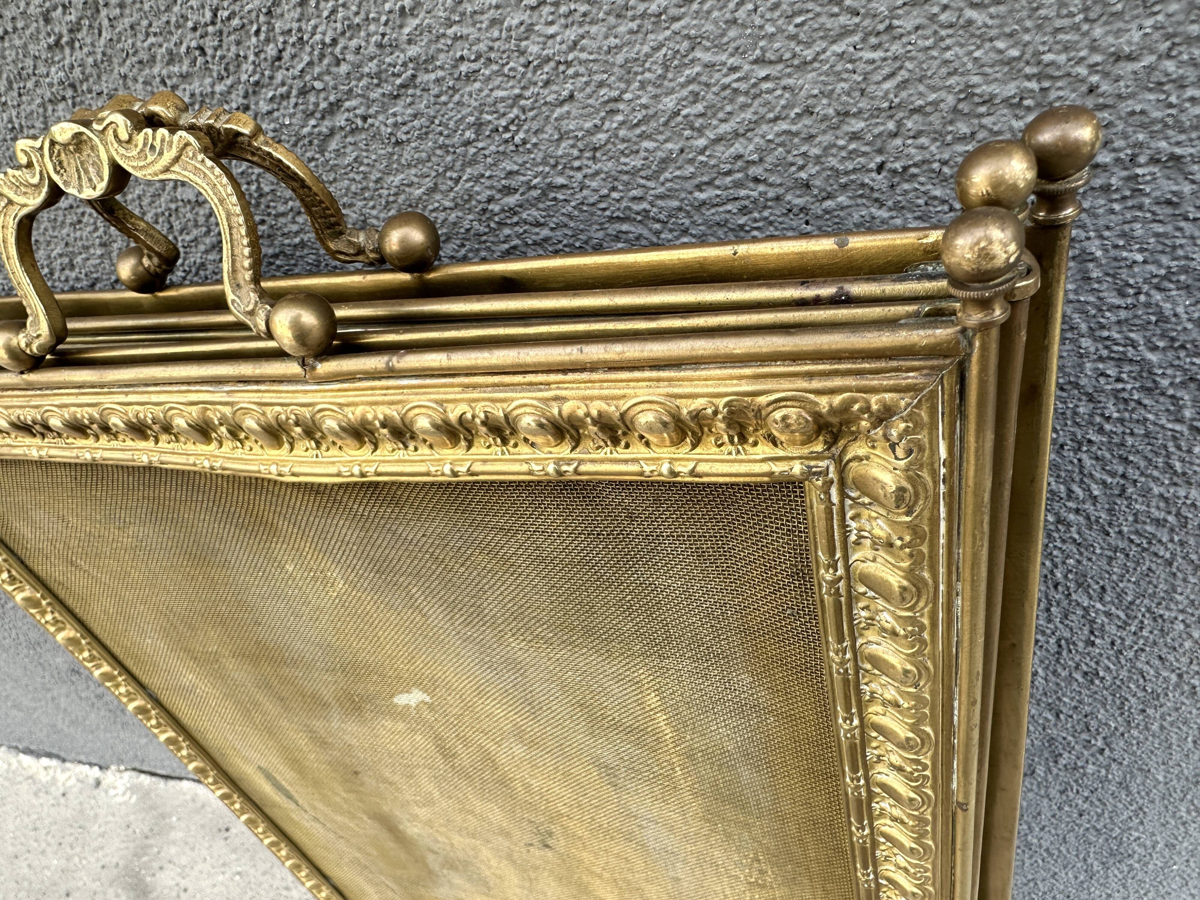 Antique brass fireplace screen from the 19th century by Bouhon Frères.