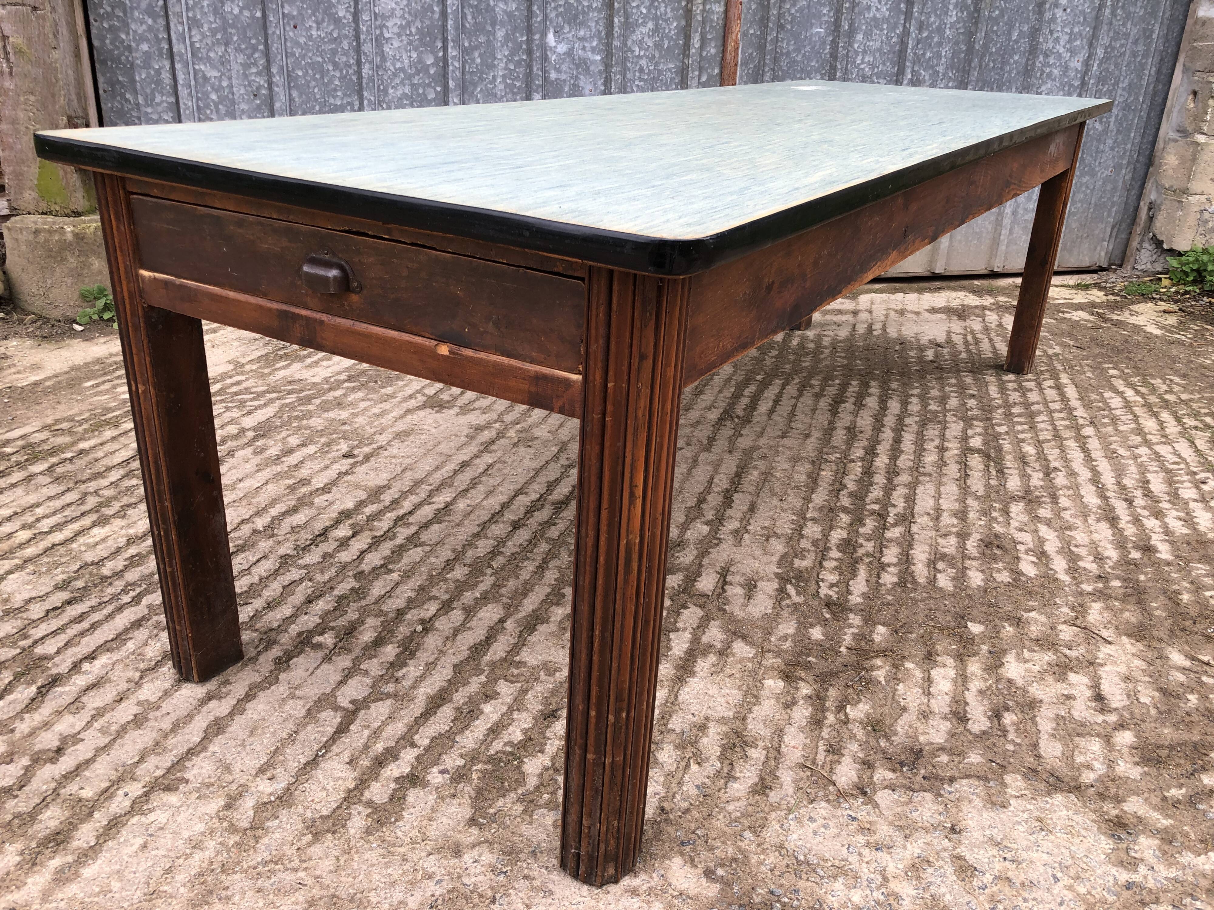Vintage farm table from the reconstruction period in fir.