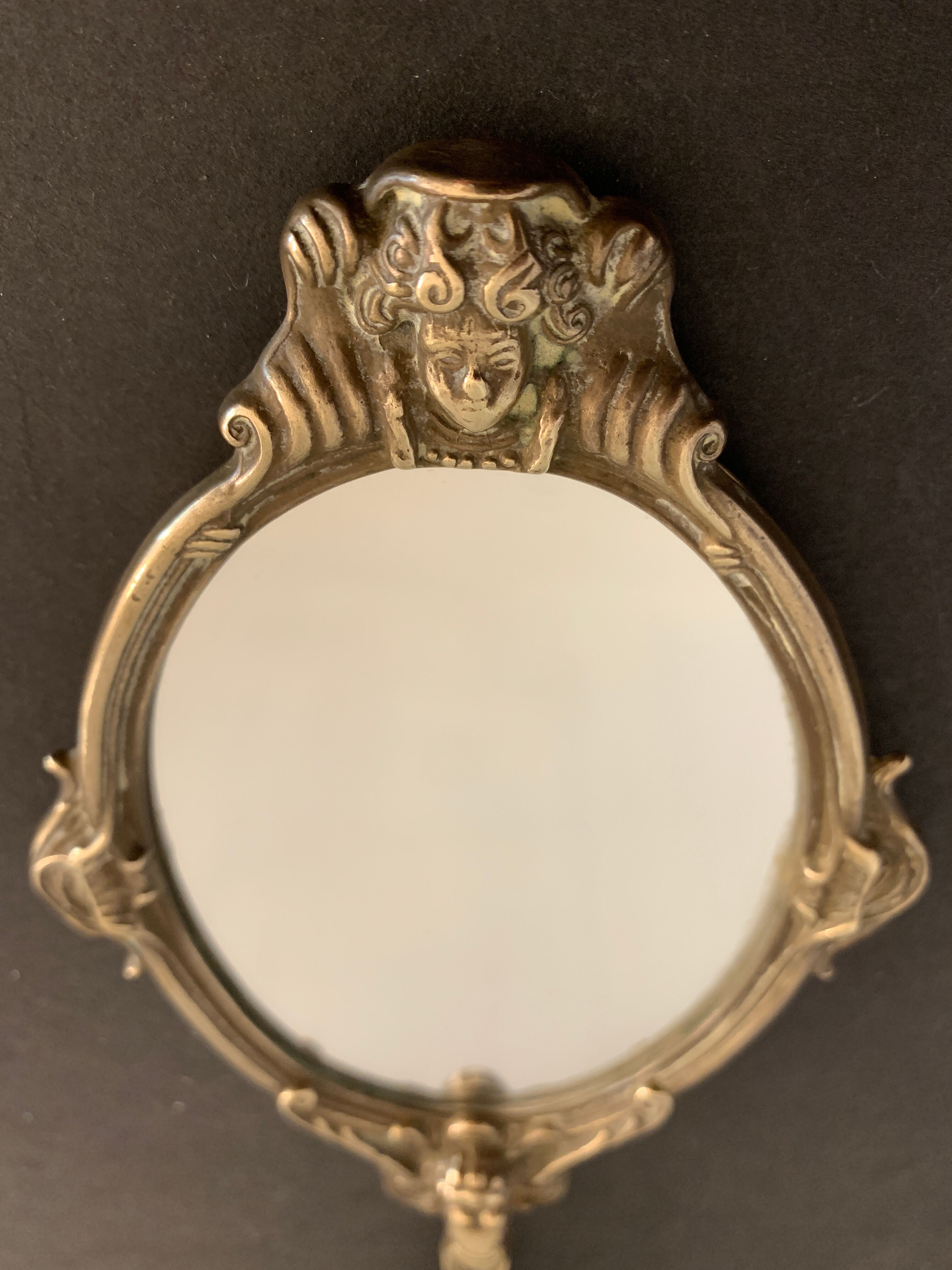 Bronze hand-facing mirror, early twentieth century, Louis XV style, 29 x 13 cm