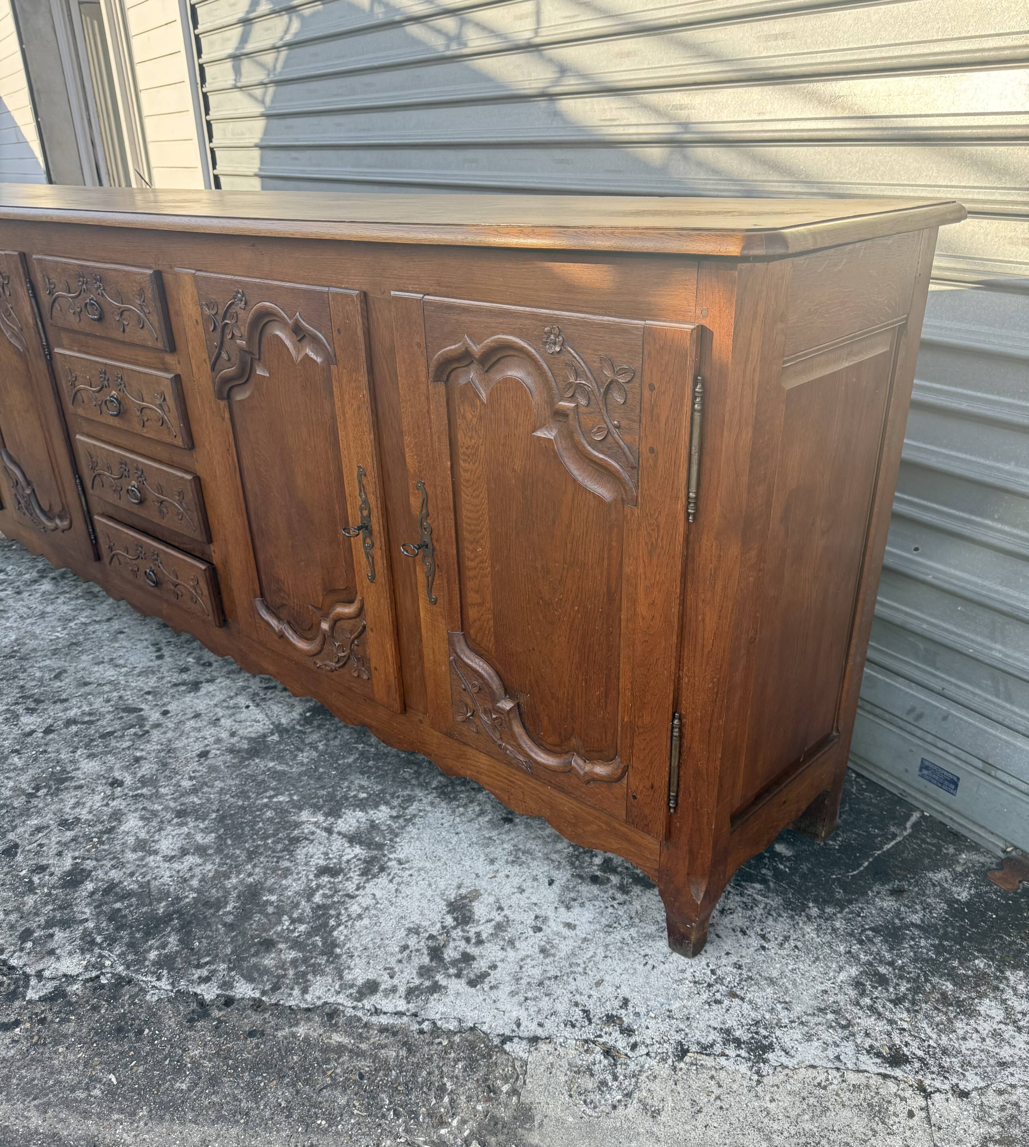 Picard enfilade in Louis XV style made of solid oak.