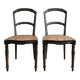 Set of 2 antique chairs in blackened wood and caned.