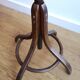 Dark wooden parrot coat holder