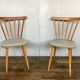 Pair of vintage white leatherette bistro chairs from the 1960s