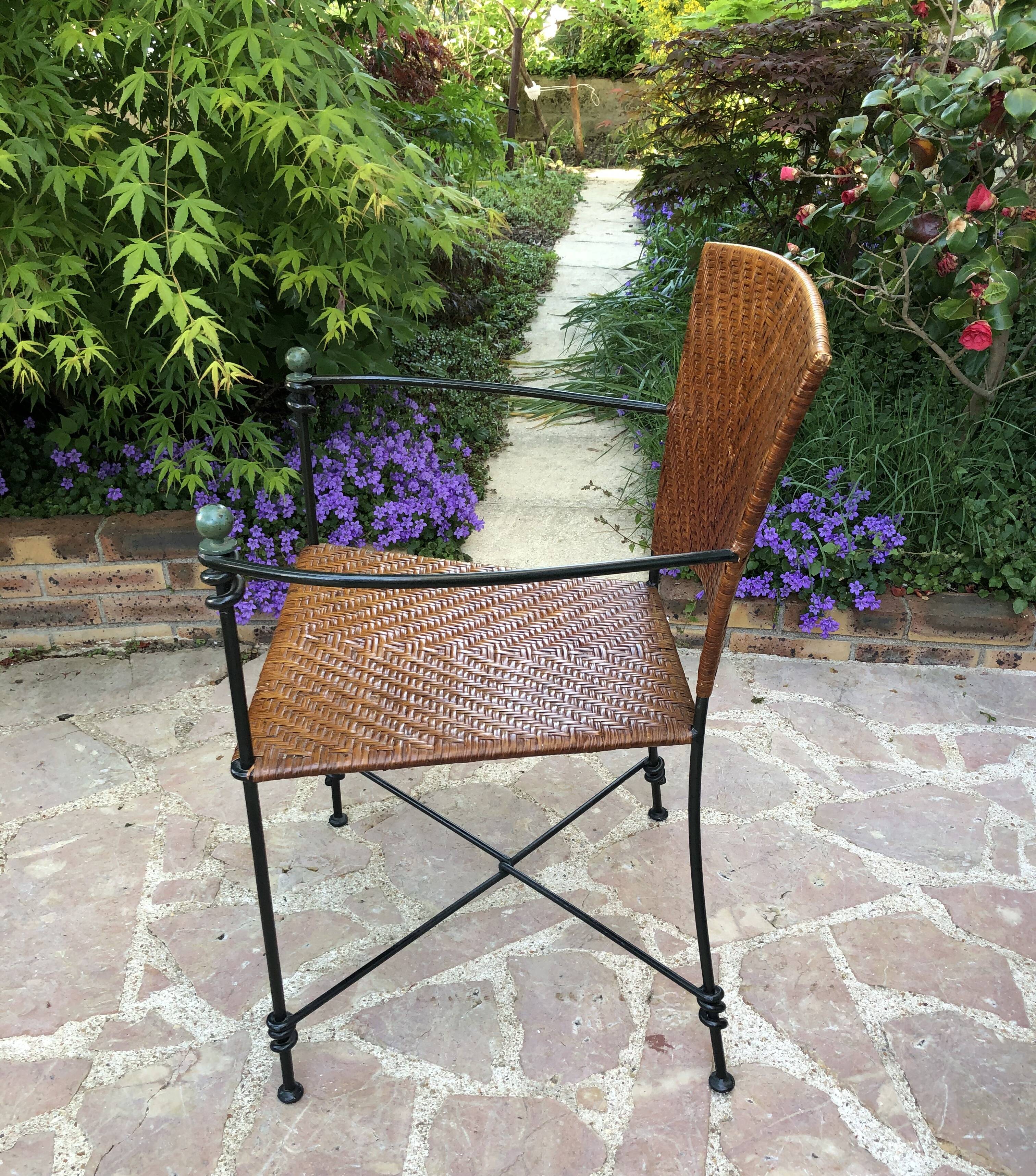 Paire de fauteuils vintage en fer forgé et osier