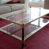 Table basse en verre et dorée