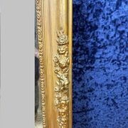 Empire period mirror in wood and gilded stucco circa 1810-1820