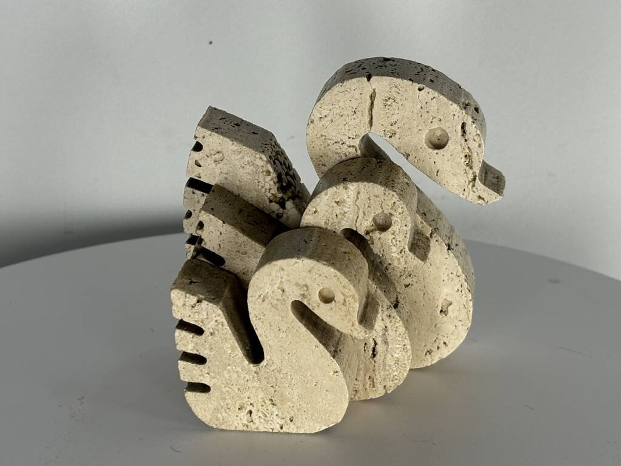 Swans Enzo Mari travertine for Fratelli Mannelli, Italy, 1970.