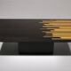 1980s Italian coffee table in black and yellow lacquered wood