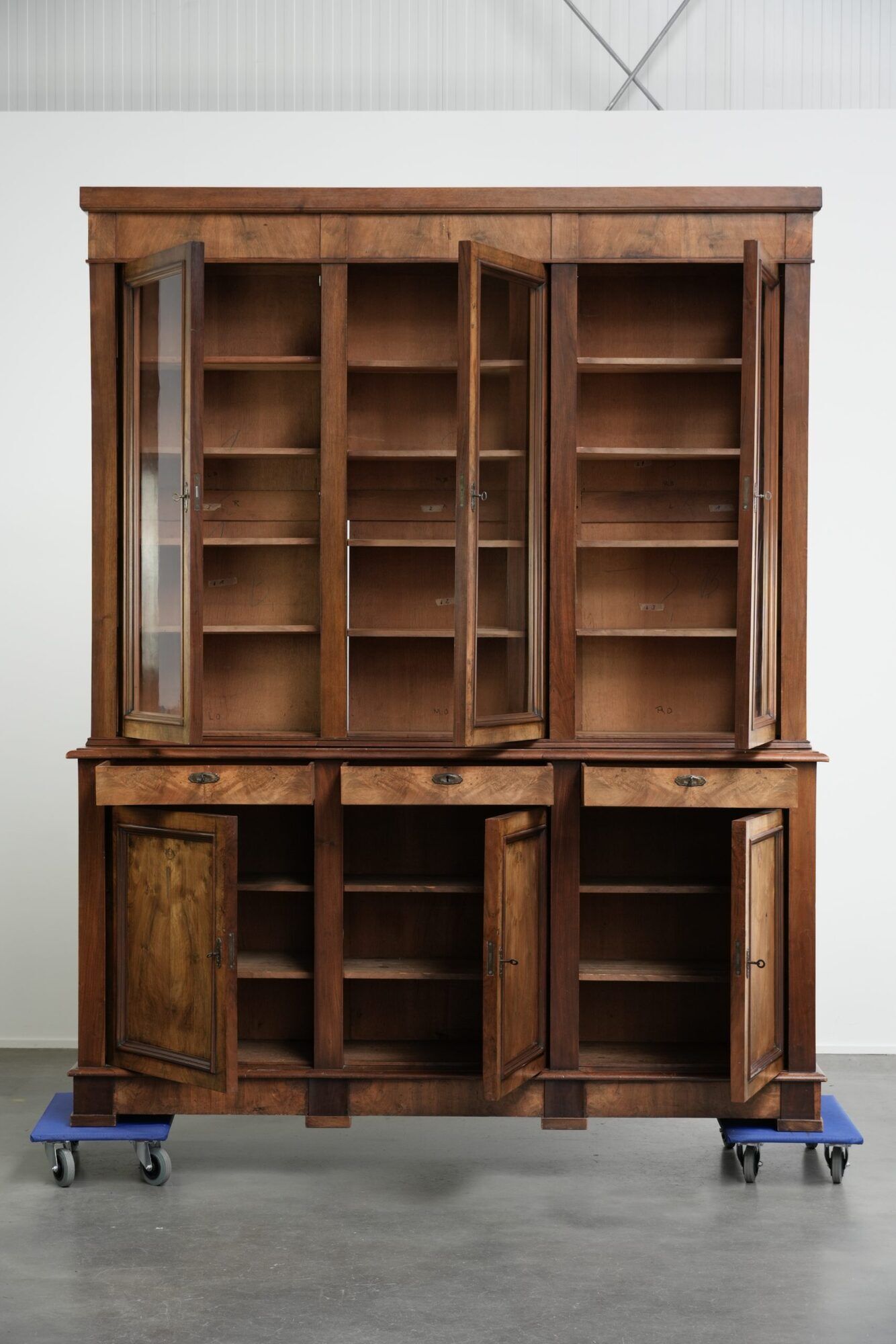 Antique English buffet/bookcase from the 19th century with original glass