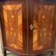Notch has two curved doors mahogany and rosewood xviii century