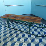 Old sledding iron and wood