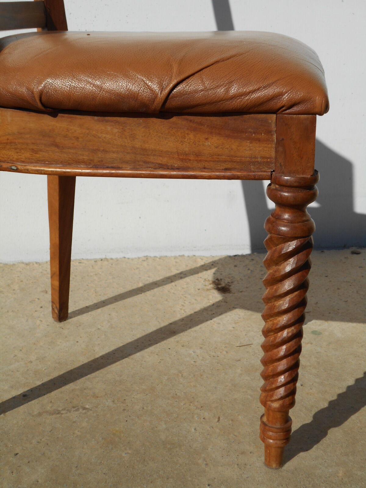 6 exotic wood and leather chairs,