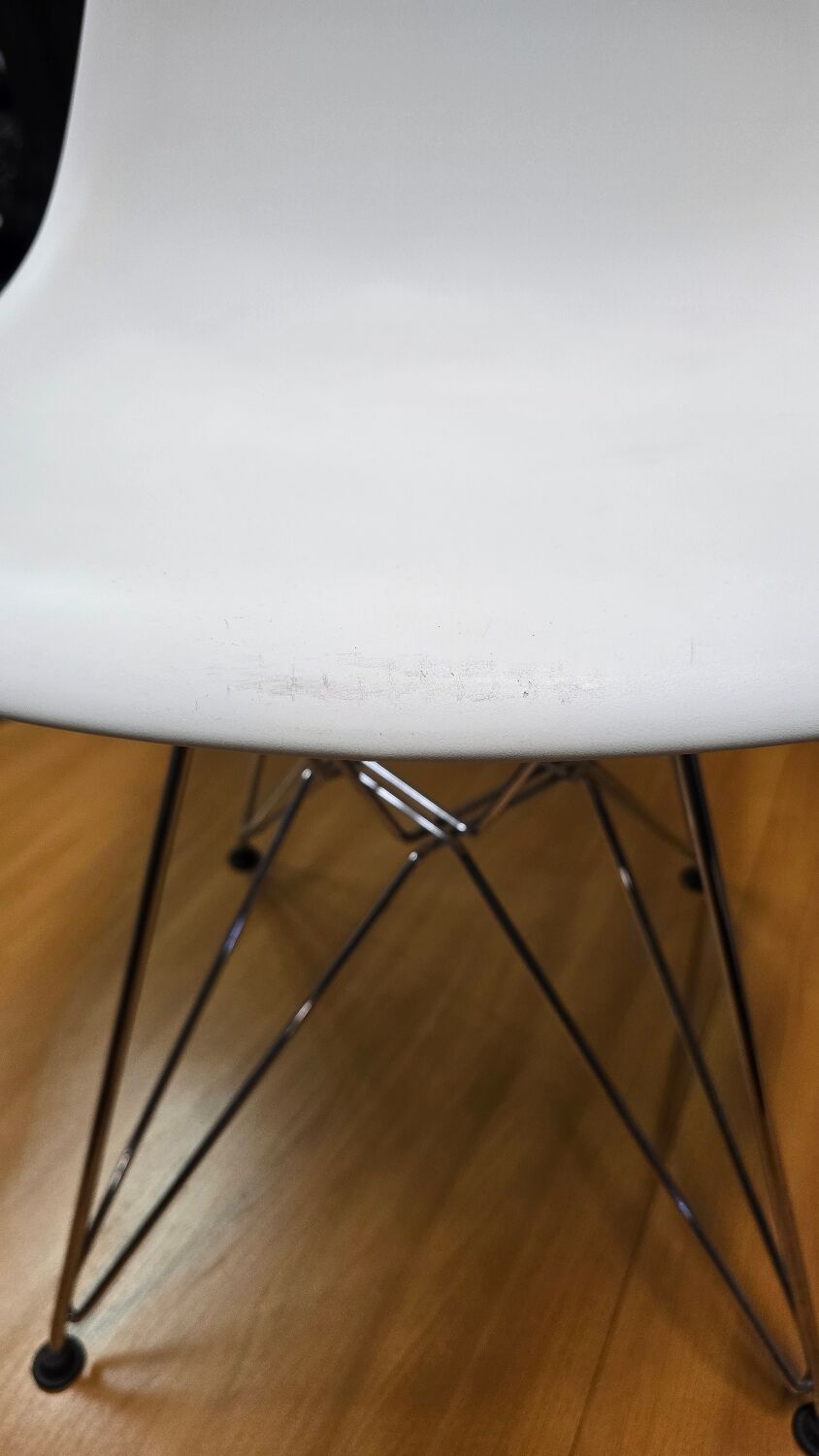 White DSR style Eames chair by Vitra with chrome Eiffel base.