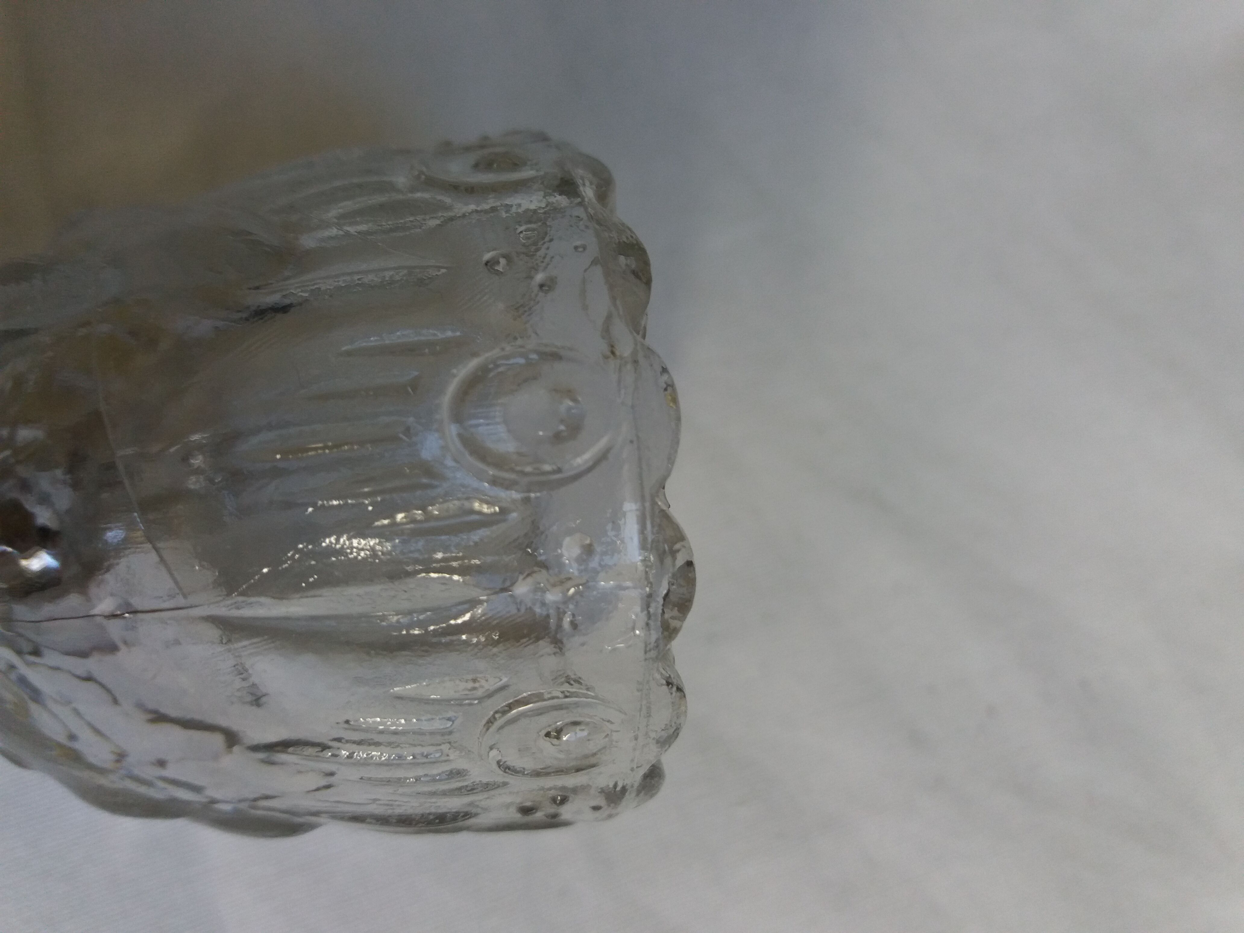 Molded glass egg cup with pigeon bird