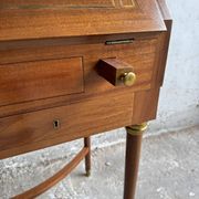 DeCoene antique wood writing desk with beige striped upholstered chair, brass-accented classic set