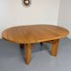 Extendable round table Maison Regain in solid elm, 1970s design.