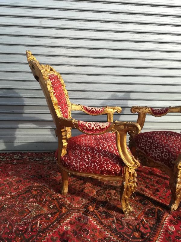 pair of gilded wooden ceremonial chairs