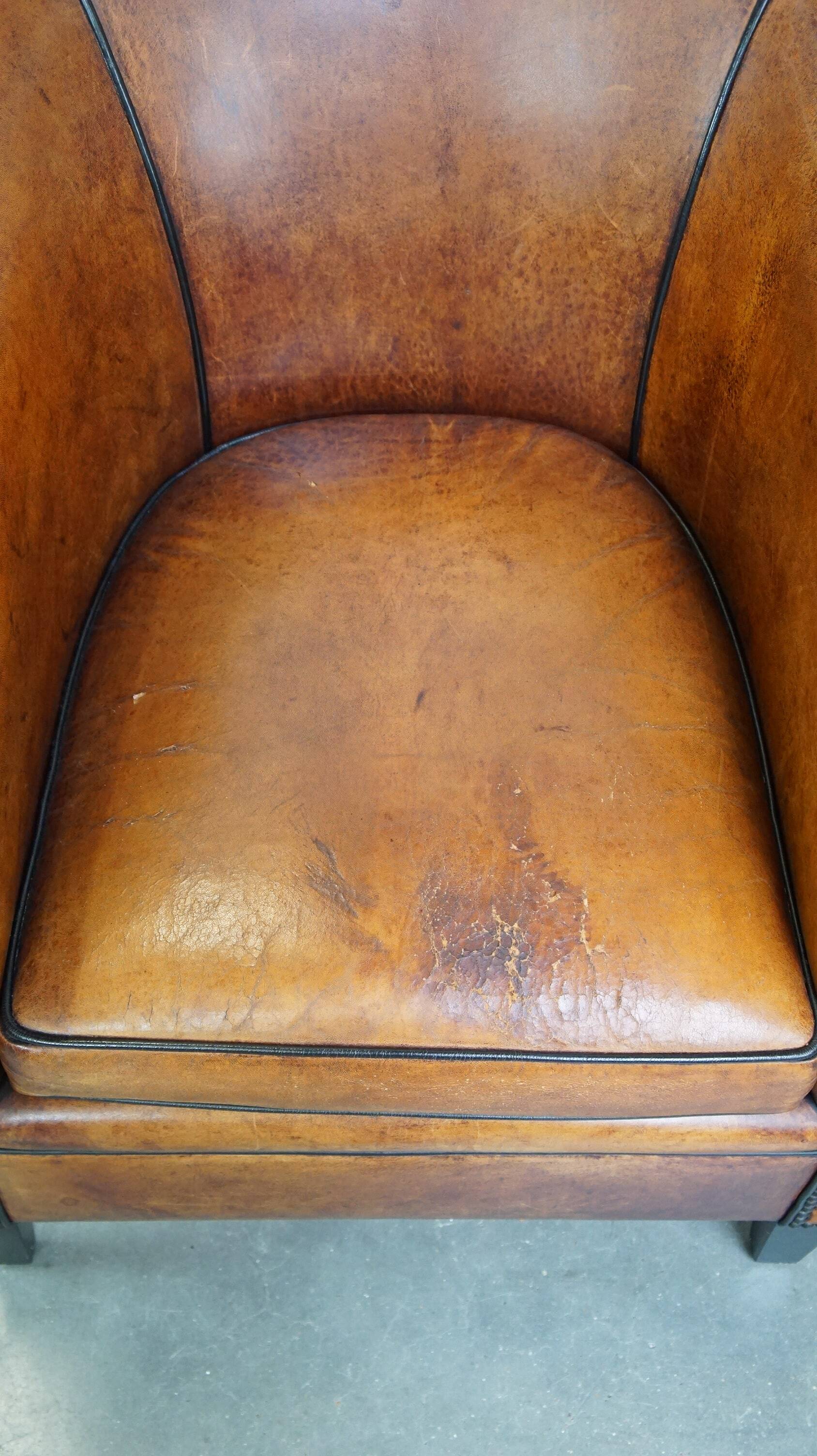 Fauteuil club vintage en cuir de mouton