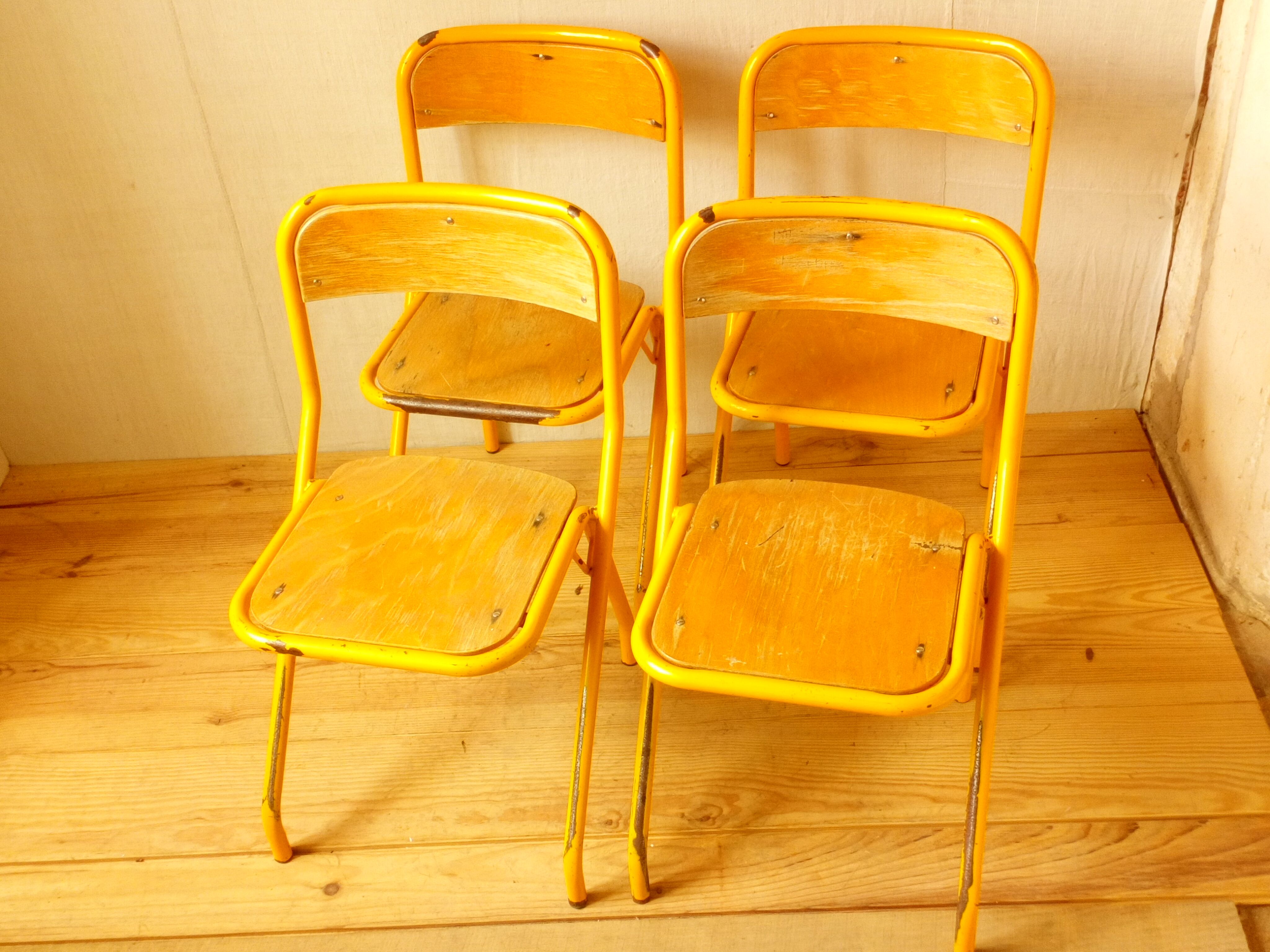 Four school chairs