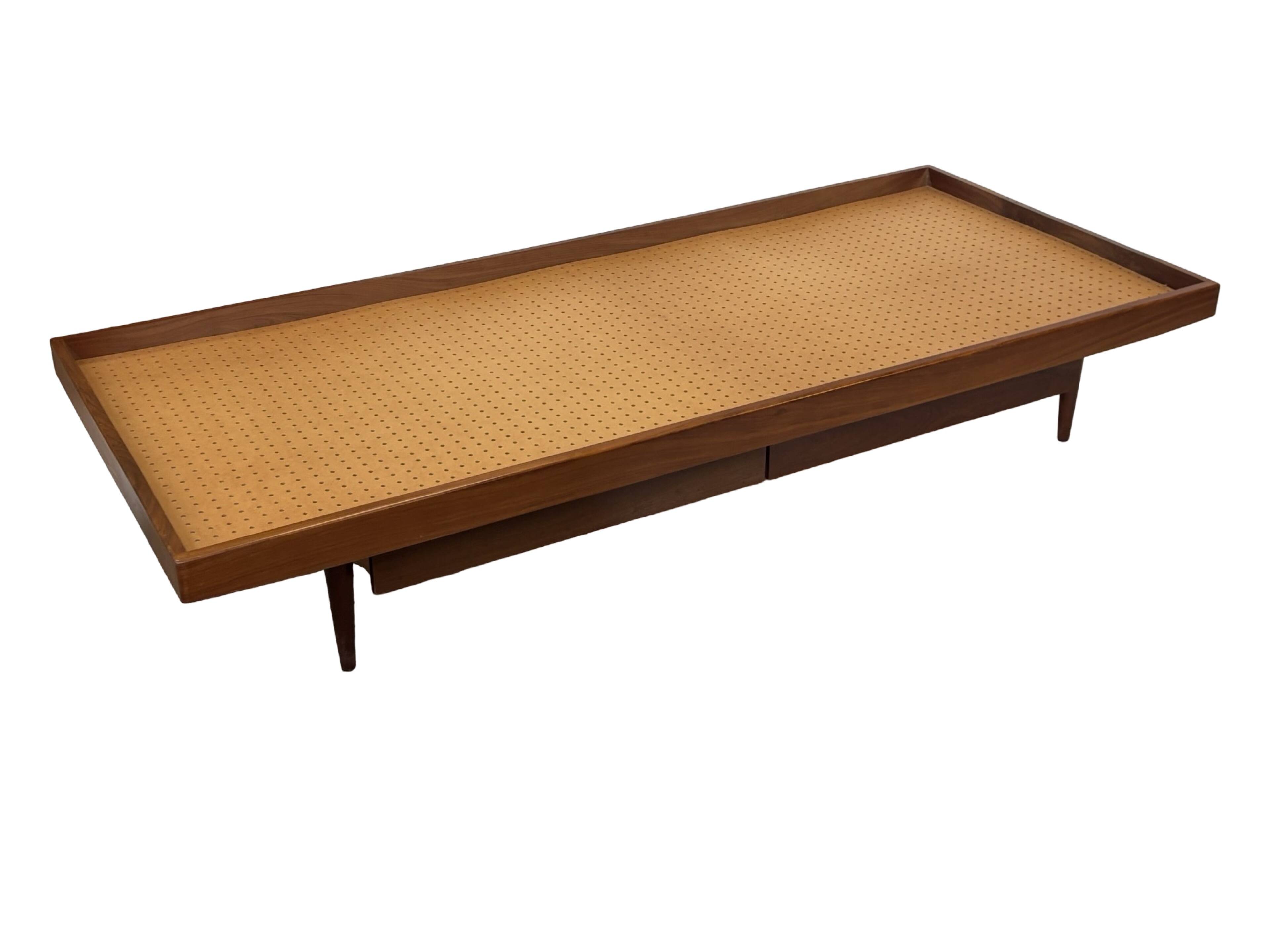 Vintage 1950s teak sofa bed with drawers.
