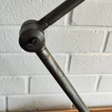 Old industrial two-arm workshop lamp