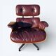 Original Eames lounge chair by Herman Miller in burgundy rosewood.