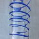 Glass vase on a pedestal with a blue trim.