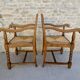 Paire de fauteuils néo-basques, en bois et assise paillée