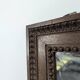 Louis XVI style mirror in carved walnut.