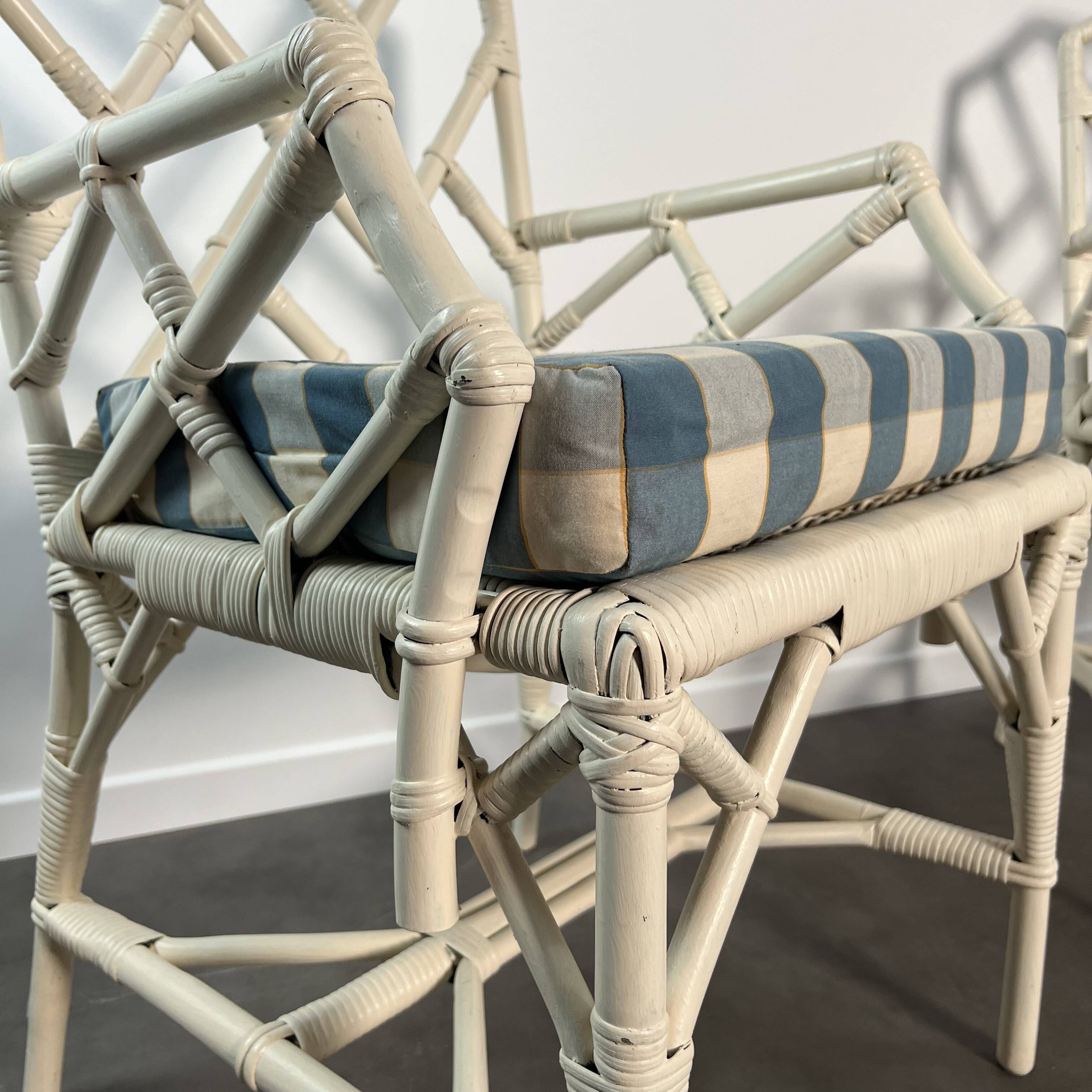 Pair of Angraves armchairs model Invincible in Chinese Chippendale style.