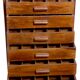 Former antique Burmese teak workshop cabinet with top glass tray