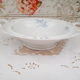 Compotier on porcelain pedestal decoration pale blue flowers