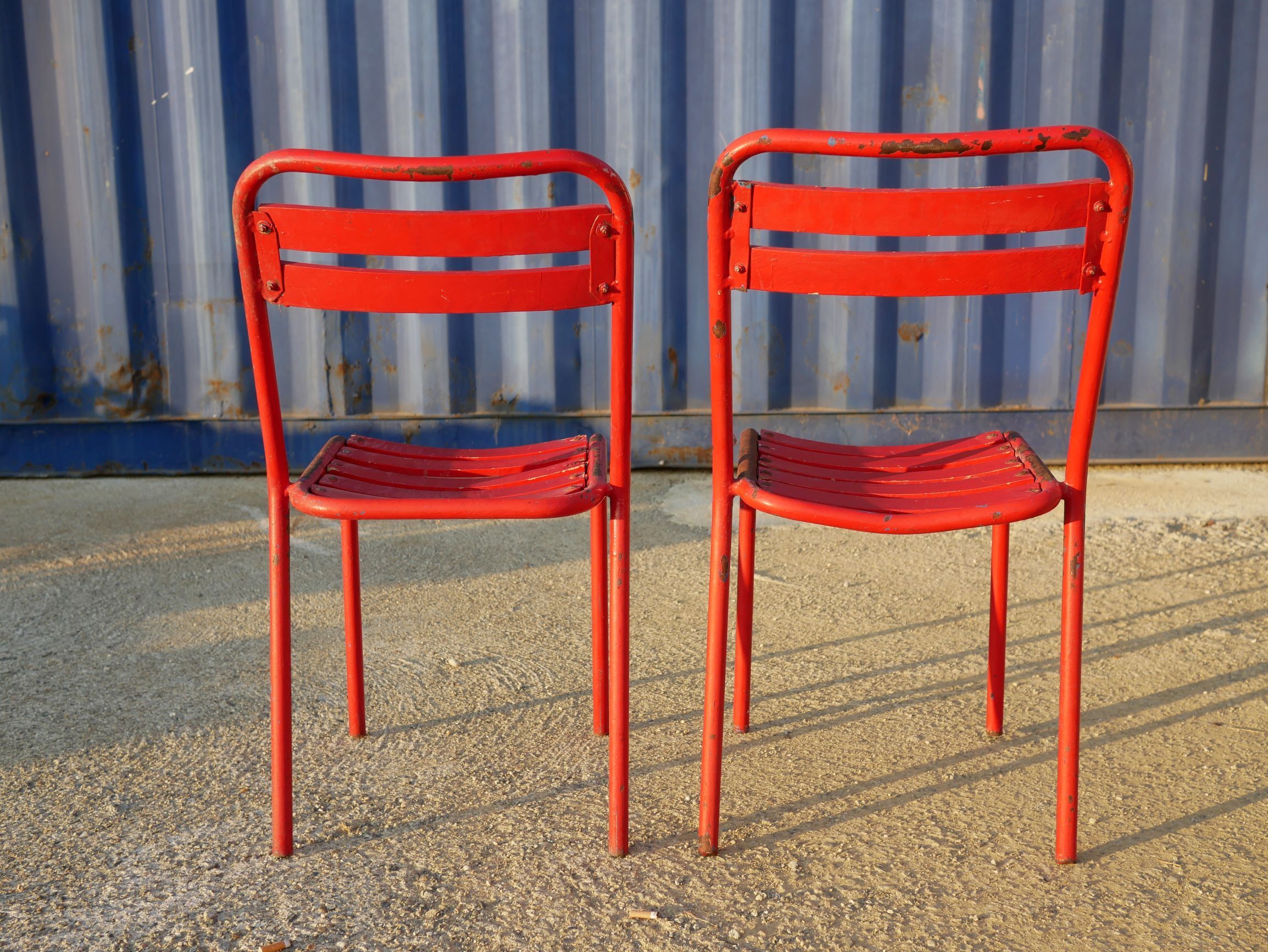 2 chairs Tolix T2 red by Xavier Pauchard