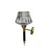 Vintage wall sconce torch in brass, thick glass globes.