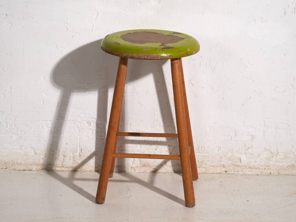 Antique wooden stool with a round seat – Central Europe, circa 1950