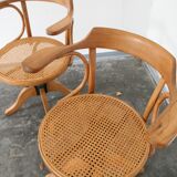 A pair of vintage bent wood svivel chairs by Salvaatore Leone Italy