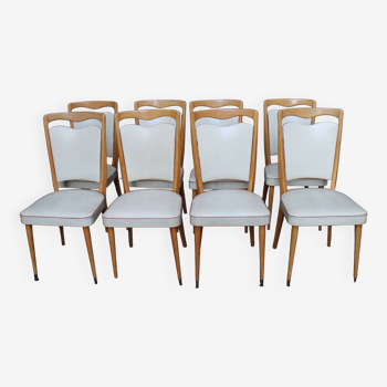 series of 8 vintage skai and wood chairs