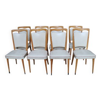 series of 8 vintage skai and wood chairs