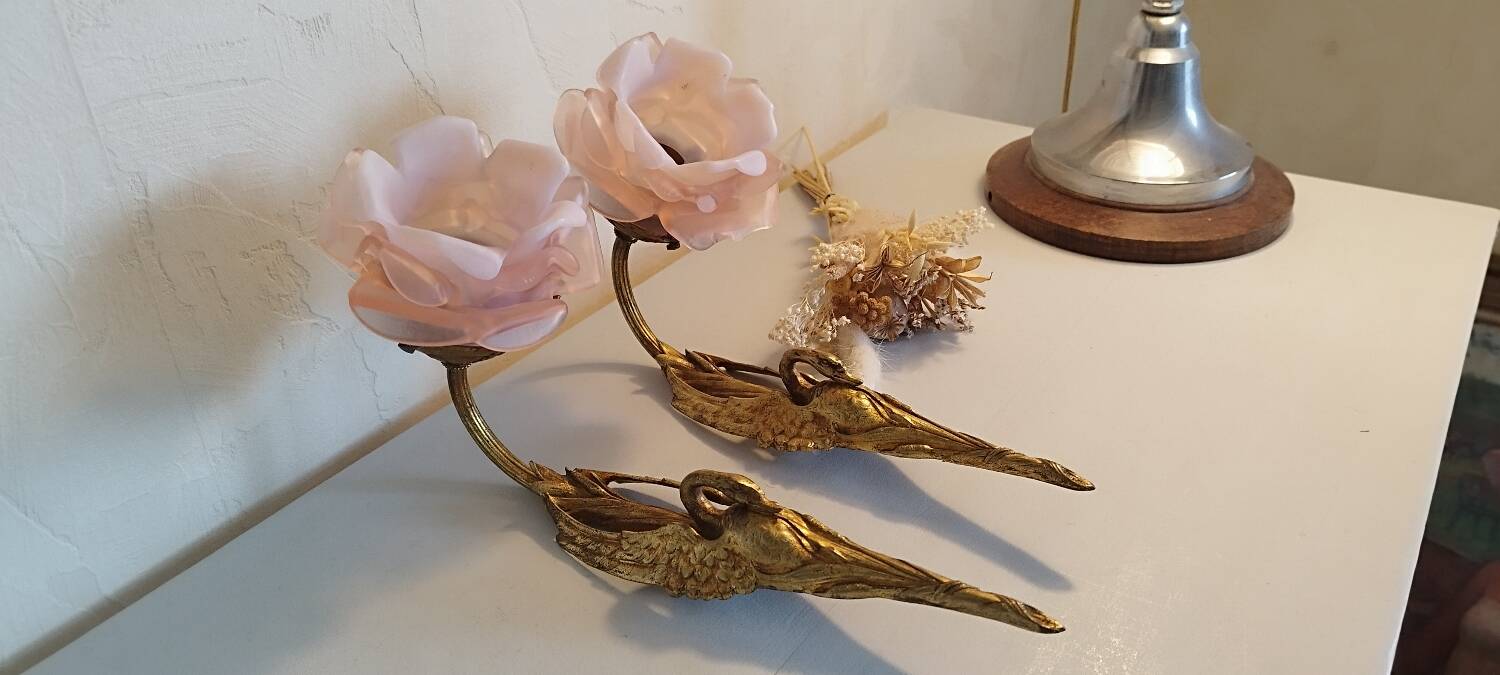 Pair of bronze swan and pink tulip wall lights in glass paste