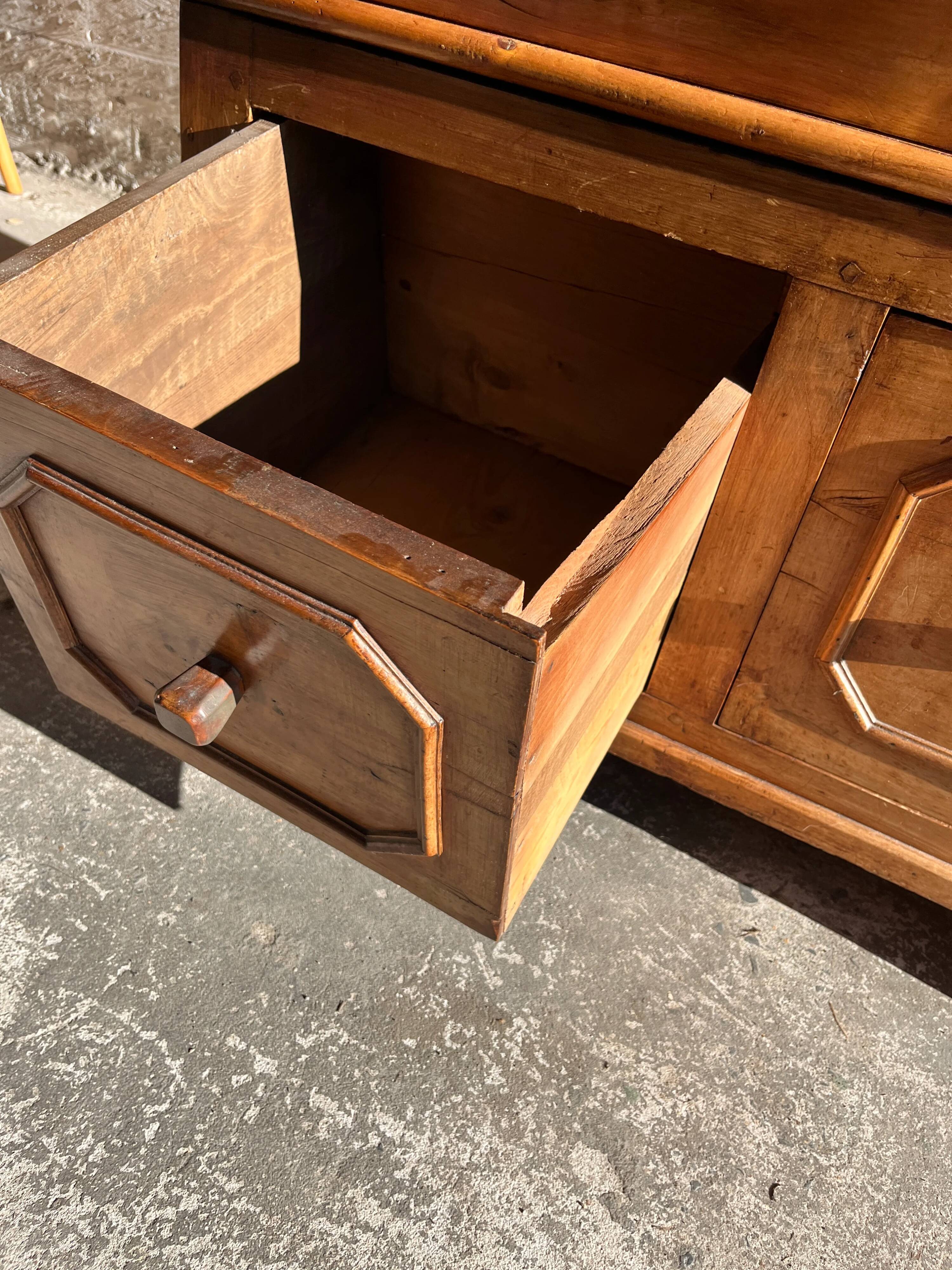 Old wooden baker's chest with storage drawers